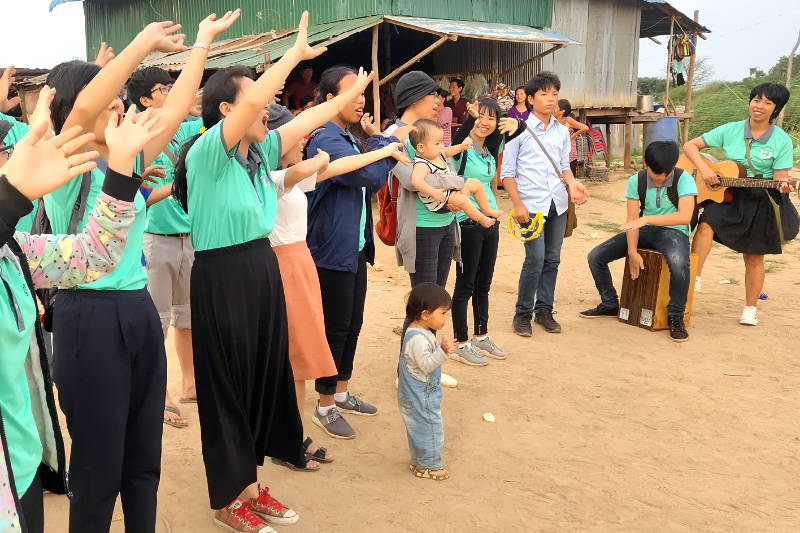 Praying on the Beach with Traveling Apostles